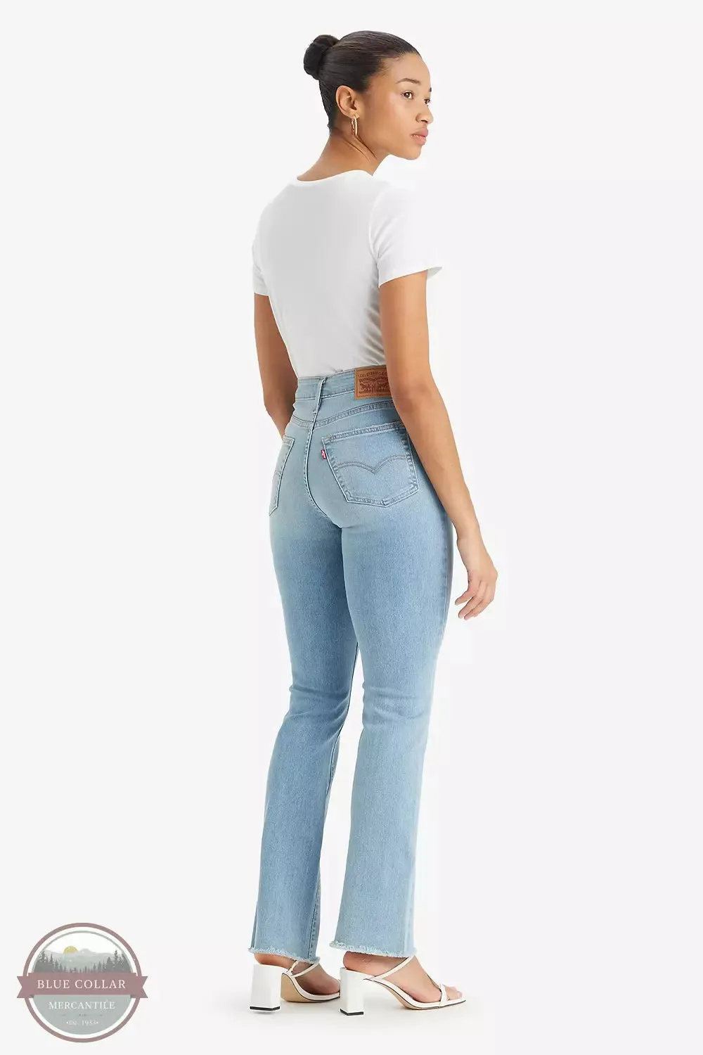 725 High Rise Bootcut Jeans in Just Landed Light Wash by Levi's 18759-0154