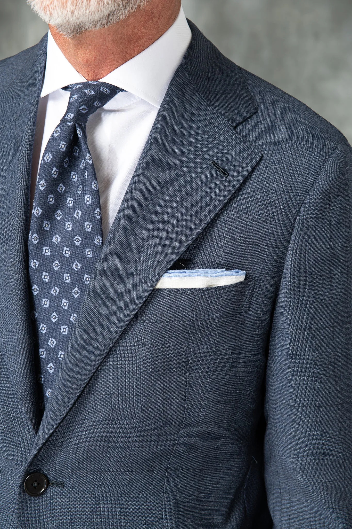 Blue Avio Prince of Wales Full Canvas suit in Loro Piana Wool - Made in Italy