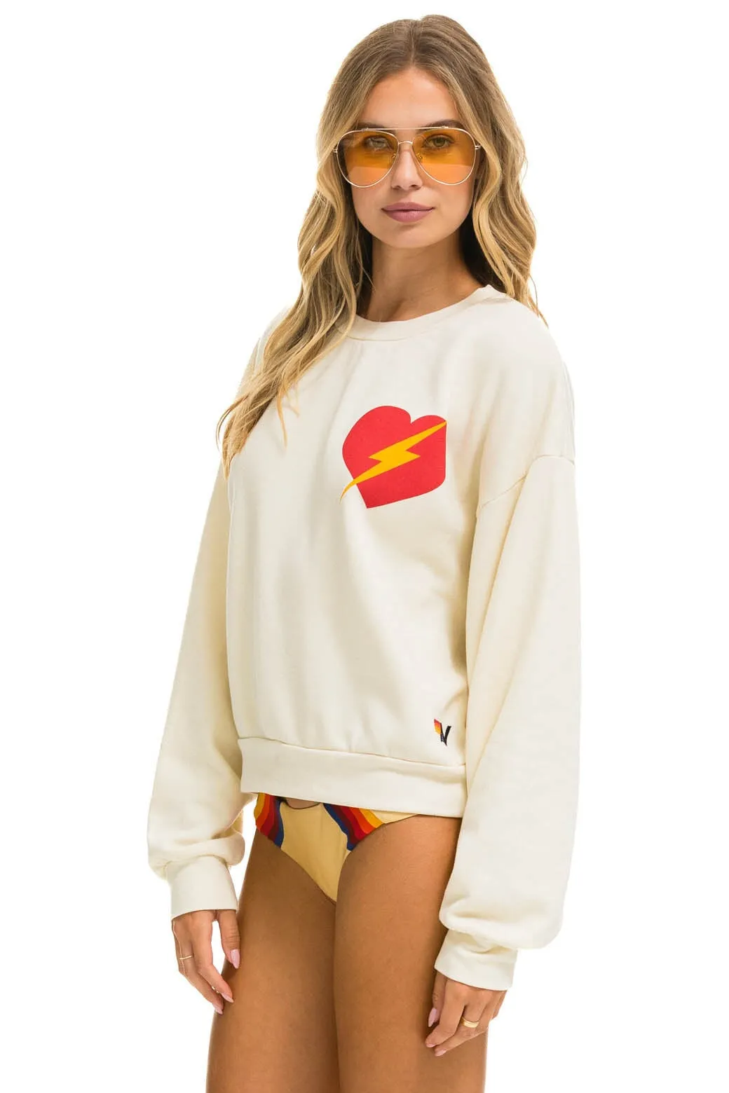 Vintage White Bolt Heart Relaxed Fit Crew Sweatshirt for Ultimate Comfort