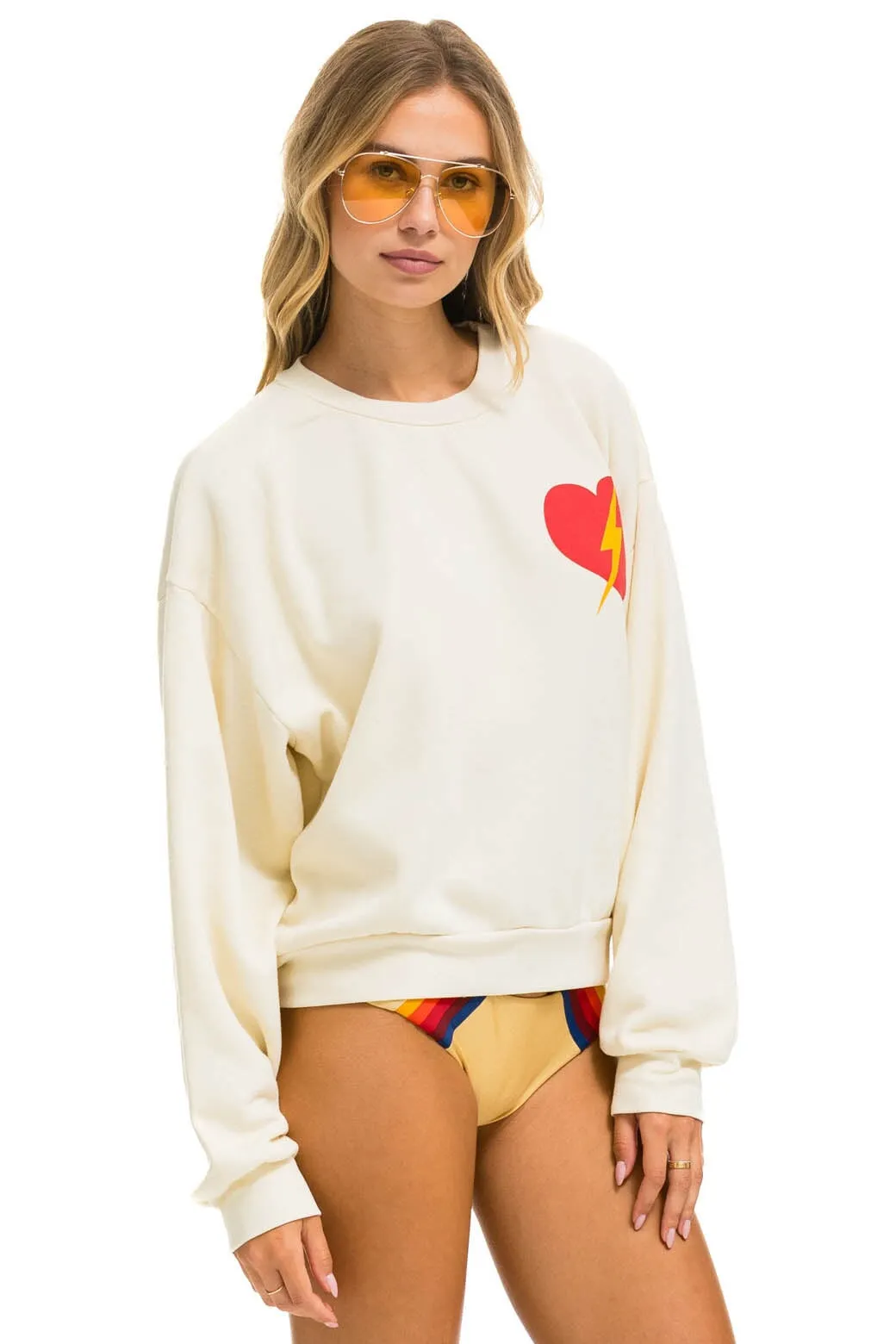 Vintage White Bolt Heart Relaxed Fit Crew Sweatshirt for Ultimate Comfort