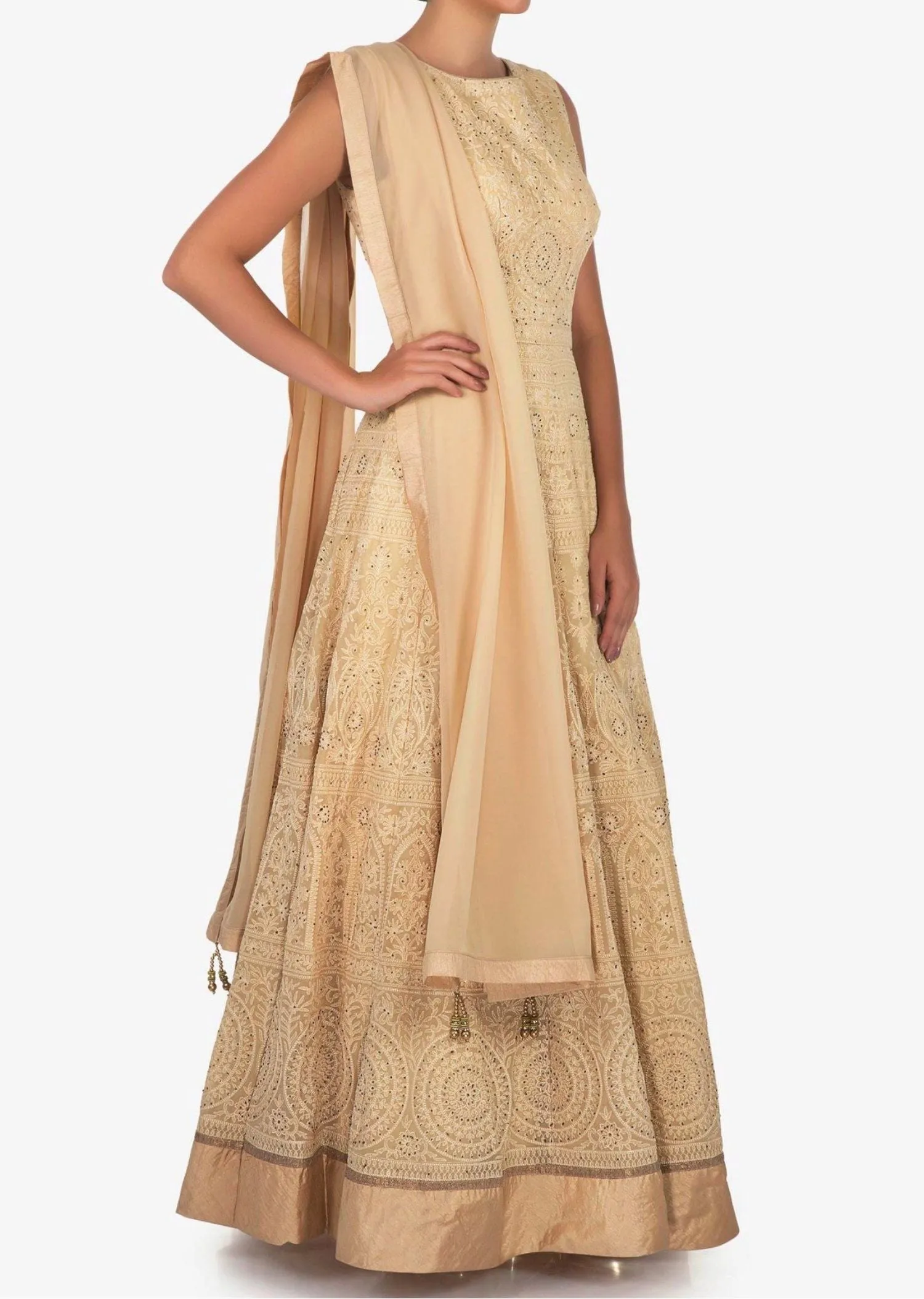 Cream anarkali suit featuring the heavy lucknowi thread work