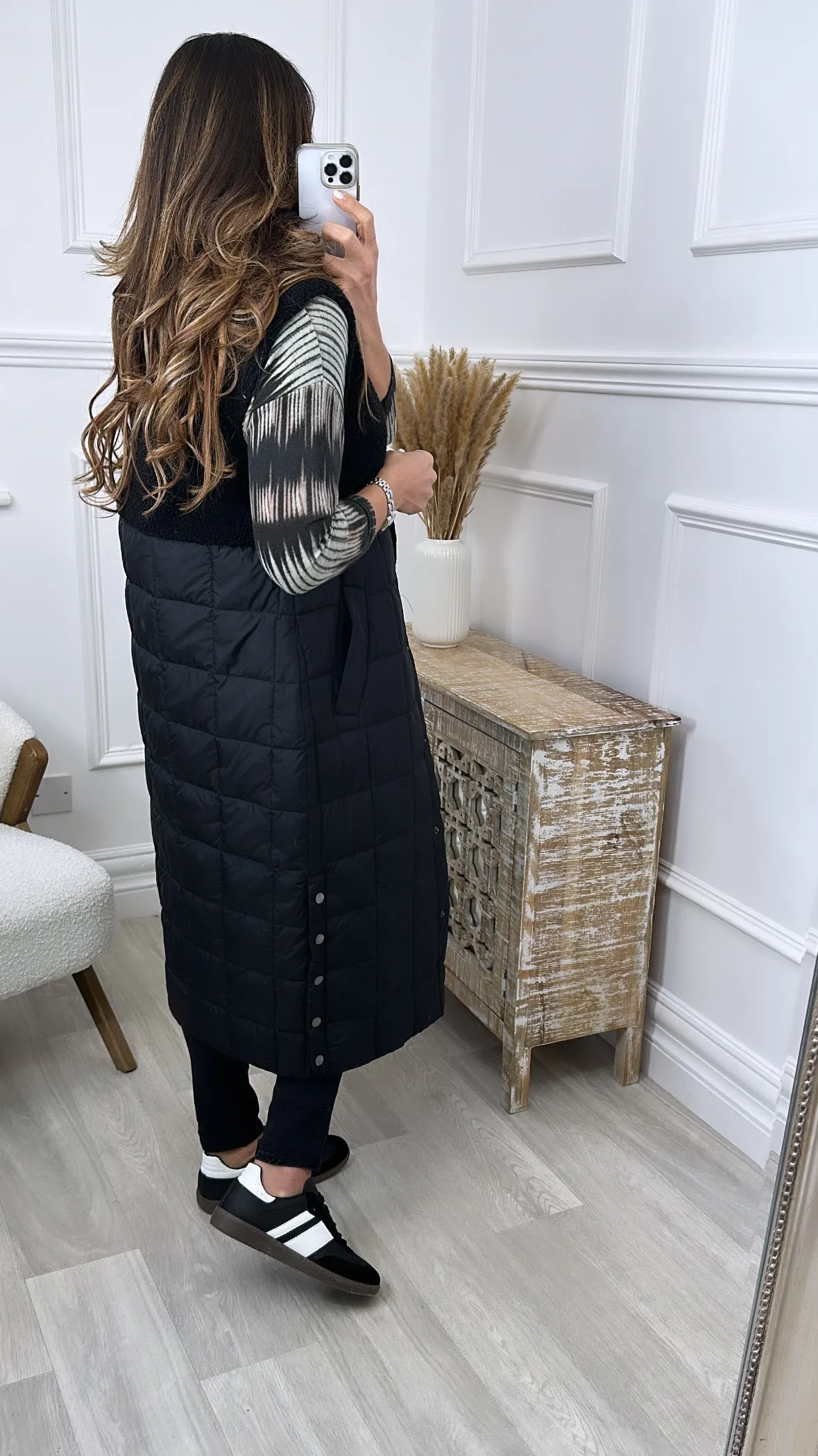 Here is an optimized title for the product: Molly Black Quilted Teddy Gilet Vest - Cozy and Stylish Layer for Women