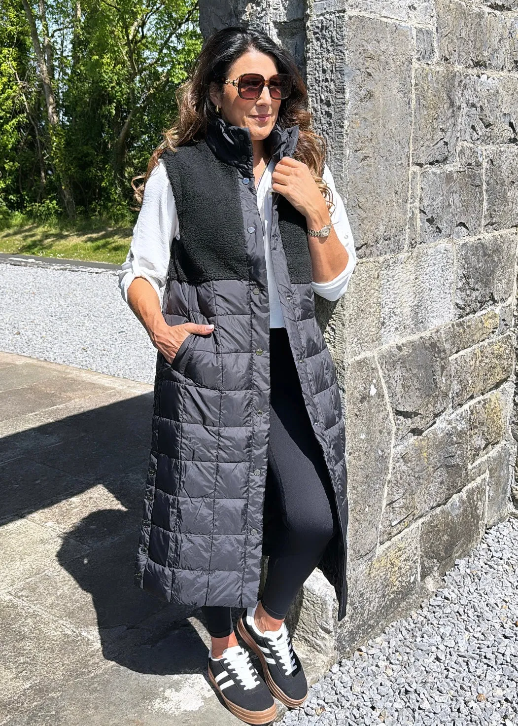 Here is an optimized title for the product: Molly Black Quilted Teddy Gilet Vest - Cozy and Stylish Layer for Women