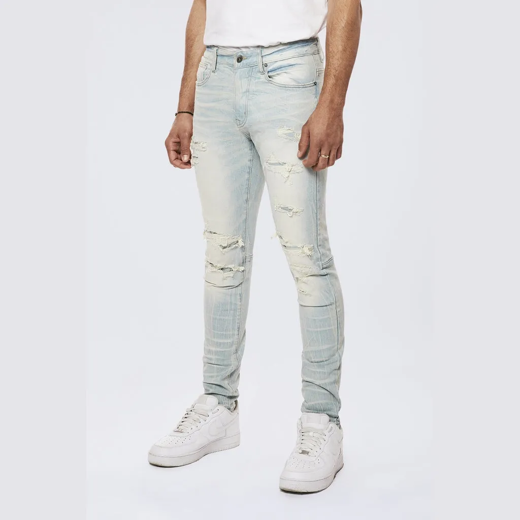 Rip & Repaired Color Slim Tapered Denim Jeans - Speckle Blue